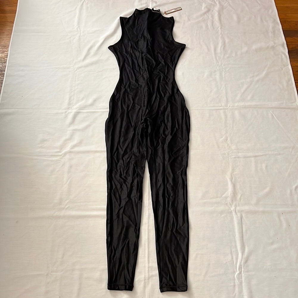SKIMS SHINE JERSEY MOCK NECK SLEEVELESS CATSUIT